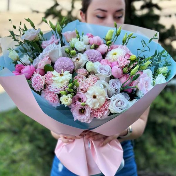 "Golden Opera" bouquet with eustoma, dahlias, Butterfly ranunculus, roses, spray roses, eucalyptus, chrysanthemums, and dianthus.
