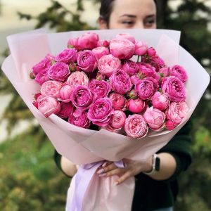 'Rose Poetry' featuring a variety of peony roses and baby's breath—a poetic symphony of love and beauty.