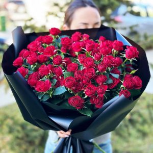 The "Spray Rose Symphony" features delicate spray roses, evoking appreciation and admiration in a harmonious bouquet.