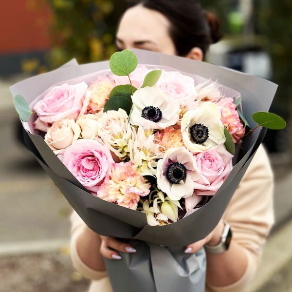 A captivating bouquet featuring hydrangeas, roses, and dianthus, combining classic and delicate beauty in perfect harmony.