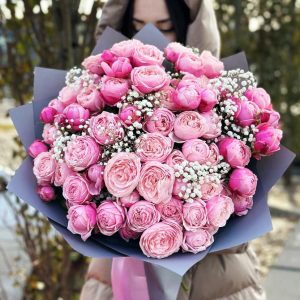 Image of the "Graceful Spray Roses Harmony" bouquet, showcasing a beautiful arrangement of spray roses and gypsophila. The delicate blooms create an elegant and harmonious floral display, perfect for various occasions.