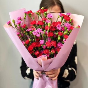 Petite Carnation Charm: A visually enchanting arrangement showcasing mini carnations, adding a touch of elegance and sweetness to your setting.