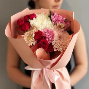 Autumn Elegance: A sophisticated arrangement showcasing chrysanthemums, spray roses, dianthus, and aster, capturing the timeless beauty of autumn.