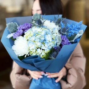 Timeless Elegance Bouquet: A curated arrangement showcasing the timeless beauty of hydrangea, vibrant chrysanthemums, sunny solidago, unique eryngium, and silvery dusty miller, creating a sophisticated and contemporary floral display.
