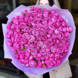Peony Elegance Bouquet: A stunning arrangement showcasing peony-like roses that mimic the lush and layered petals of peonies, radiating opulence and romance.