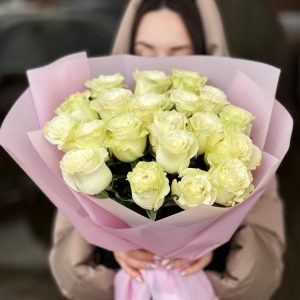 Pure Elegance Bouquet: A stunning arrangement showcasing pristine white roses, symbolizing purity and enduring love, perfect for special moments or adding timeless elegance to your space.