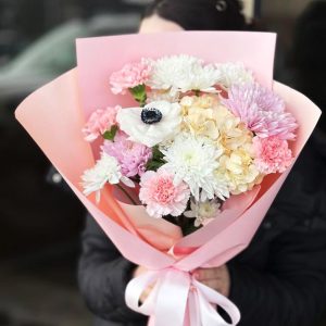 Blooming Garden Medley: A harmonious blend of hydrangeas, chrysanthemums, dianthus, and anemones.