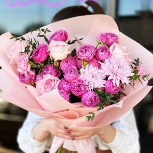 Spring Symphony Bouquet featuring spray roses, roses, chrysanthemums, dianthus, and eucalyptus