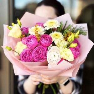 Sunny Spring Bliss Bouquet featuring spray roses, lisianthus, chrysanthemums, mimosa, and ranunculus