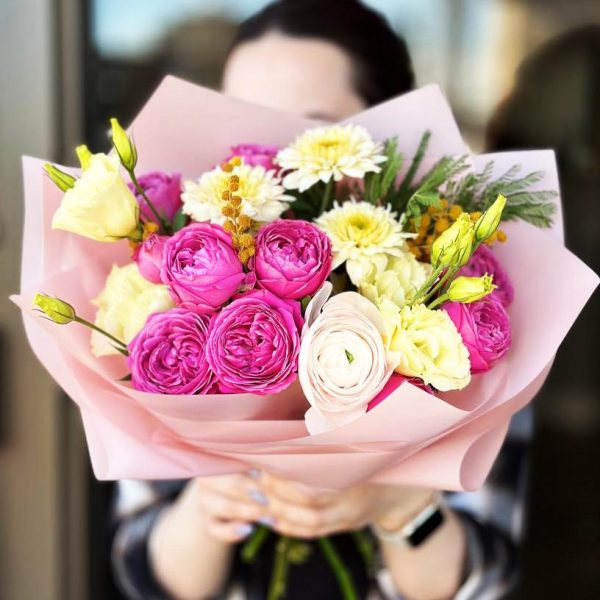 Sunny Spring Bliss Bouquet featuring spray roses, lisianthus, chrysanthemums, mimosa, and ranunculus