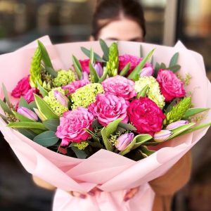 Spring Elegance Bouquet featuring roses, viburnum, ornithogalum, tulips, and eucalyptus leaves.