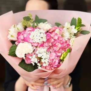 Elegant Garden Symphony Bouquet showcasing hydrangeas, alliums, alstroemerias, ornithogalums, coronations, and eucalyptus for a harmonious and enchanting display.