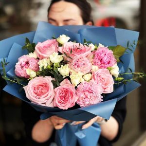 Elegant Peony Rose Bouquet showcasing peonies, roses, spray roses, and eucalyptus for a luxurious and romantic display.