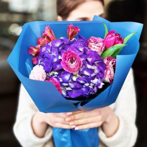 Spring Blossom Elegance Bouquet showcasing hydrangeas, roses, dianthuses, tulips, and alstroemerias for an elegant and harmonious display.