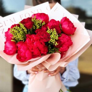 Enchanting Peony Delight Bouquet showcasing luxurious peonies, whimsical spray roses, and unique brunia for a captivating and romantic display.
