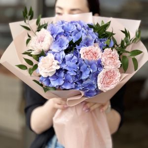 Experience the enchanting allure of spring with our exquisite bouquet collection. Handcrafted with vibrant blooms, 'The Magic of Spring' brings joy and beauty to any occasion. Discover nature's finest treasures expertly arranged to captivate your senses.