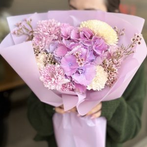 Discover the charm of our Delicate Dewdrops flower bouquet. Featuring fresh, vibrant blooms, it's the perfect gift for any occasion. Order now for fast, reliable delivery!