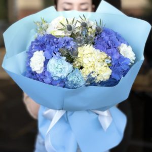 Tranquil Garden bouquet featuring fresh and harmoniously arranged flowers in a serene setting.