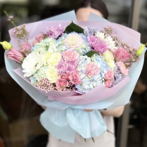 Petals of Paradise bouquet featuring vibrant and colorful flowers in a stunning arrangement.