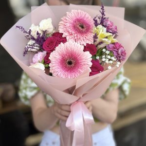 Enchanted garden bouquet with delicate blooms perfect for weddings and special occasions.